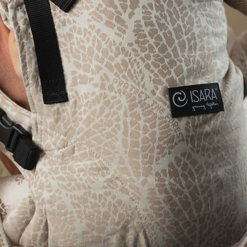 Isara The One - Majestic Ivory Forest baby carrier close-up showing soft fabric and label | Babymaxi