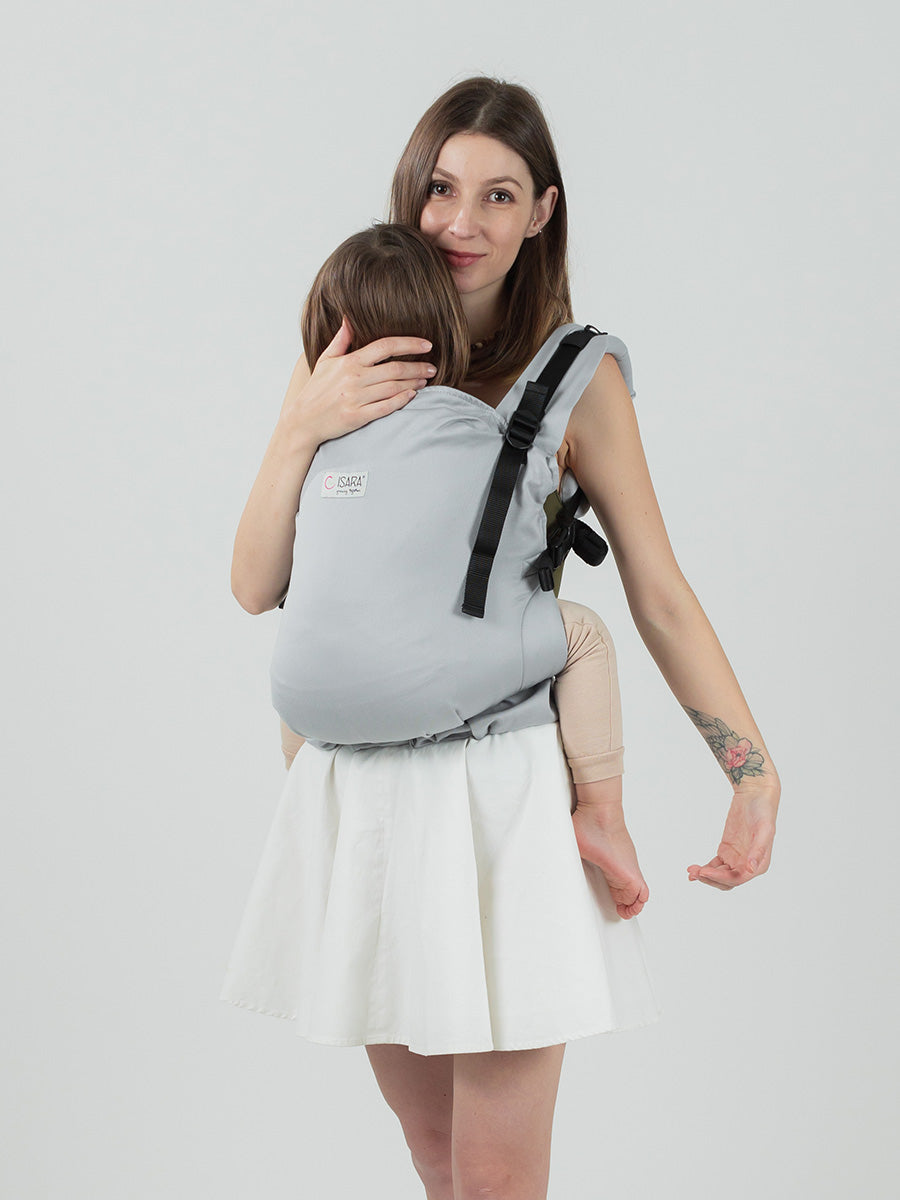 Isara Preschooler - Pearl Grey baby carrier in use, featuring a child on the back and adjustable straps | Babymaxi