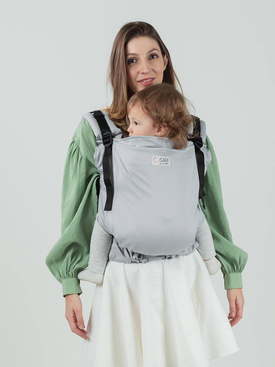 Isara Preschooler - Pearl Grey baby carrier worn by a parent with their child, adjustable and comfortable, suitable from 9 months to 8 years | Babymaxi