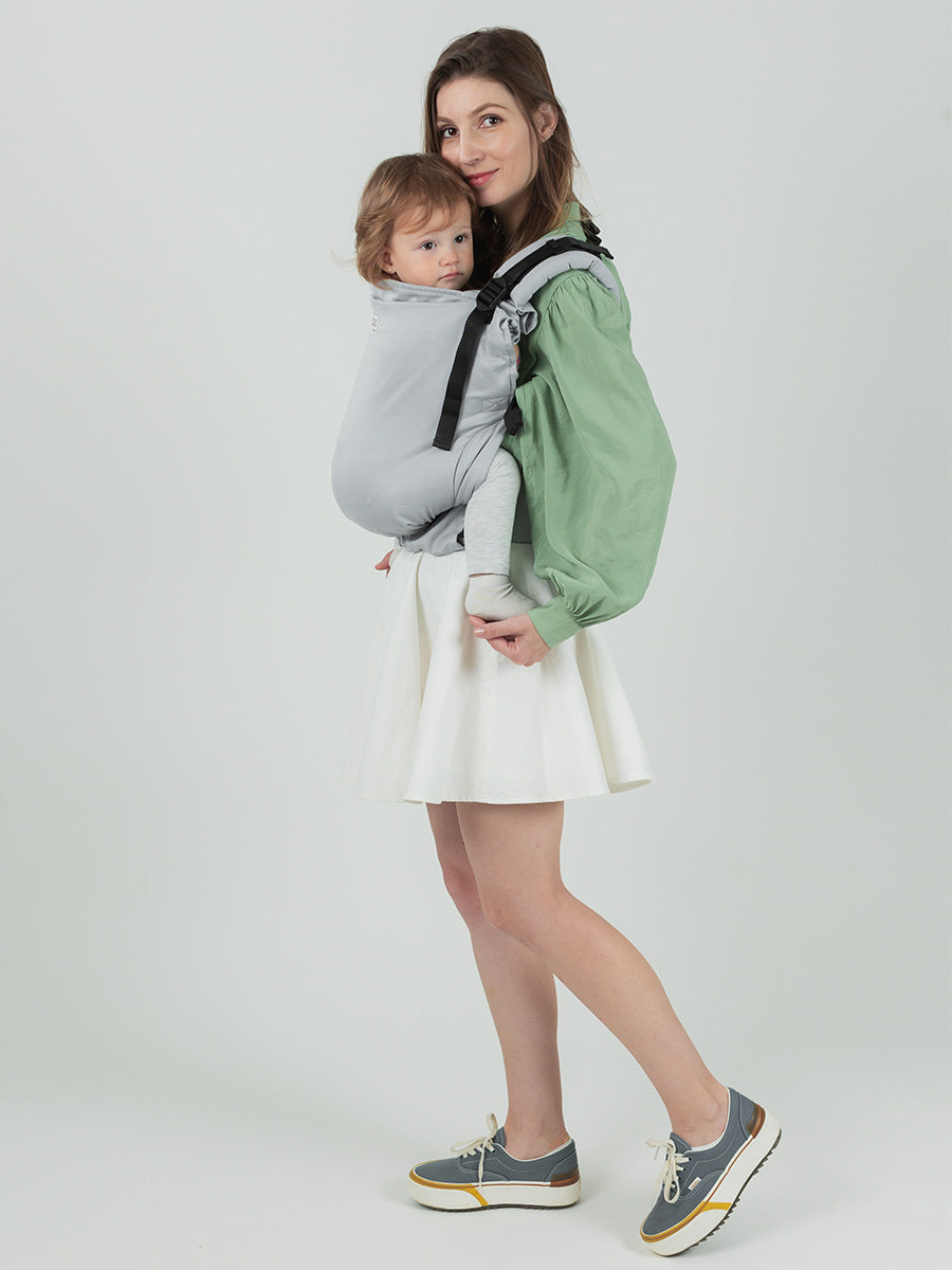 Isara Preschooler - Pearl Grey adjustable baby carrier in use, perfect for children up to 8 years, offering comfort and versatility. | Babymaxi