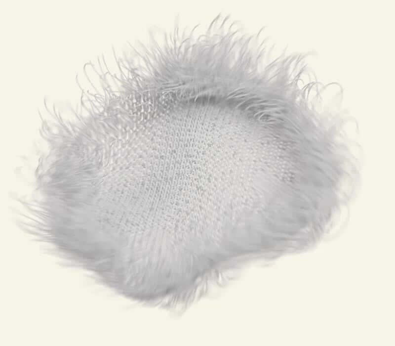 Fluffy and soft textured surface in light grey, ideal for cozy and stylish decor | Babymaxi