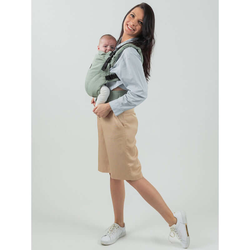 Isara The One - Sage Green Linen baby carrier in use, showcasing soft, breathable fabric for stylish babywearing | Babymaxi