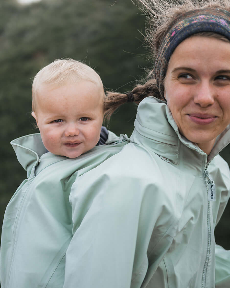 Mamalila Explorer Outdoor Baby Carrier Jacket - Mint in action with baby, featuring nature-loving moms, active lifestyles | Babymaxi