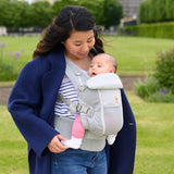 Mom using Ergobaby Adapt SoftFlex Mesh Pearl Grey baby carrier outdoors with baby, showcasing breathable design for comfort | Babymaxi