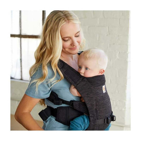 Mom carrying baby in Ergobaby Aerloom, Lightweight & Breathable - Charcoal Black carrier | Babymaxi