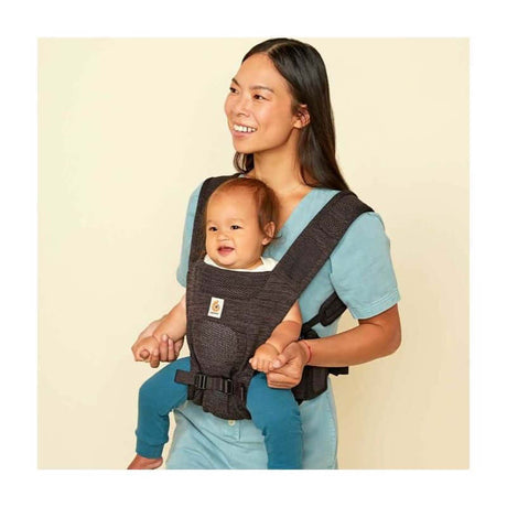 Mom carrying baby in Ergobaby Aerloom, Lightweight & Breathable - Charcoal Black baby carrier for comfort and ventilation | Babymaxi