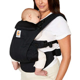 Ergobaby Omni Dream - Onyx Black baby carrier in use, adjustable for various carrying positions | Babymaxi