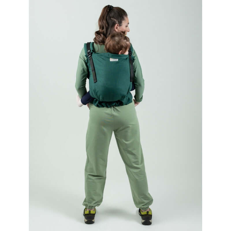 Isara Preschooler (up to 30kg) - Evergreen Linen baby carrier with child in a back carry position | Babymaxi