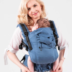 Isara The One - Bluestone ergonomic baby carrier on mother with baby, adjustable for all bodies | Babymaxi