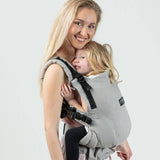 Isara The One - Misty Linen baby carrier in sage green, featuring a mother and child enjoying babywearing | Babymaxi