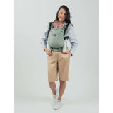 Isara The One - Sage Green Linen baby carrier worn by mom, featuring stylish sage green design | Babymaxi