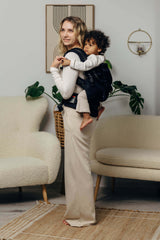 LennyLamb LennyPreschool (up to 30kg) - Little Herringbone Ebony Black carrier in use, perfect for toddlers 1-5 years | Babymaxi