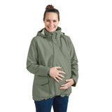 Mamalila Winter Softshell Baby Carrier Jacket - Agave worn by smiling woman, perfect for winter babywearing | Babymaxi