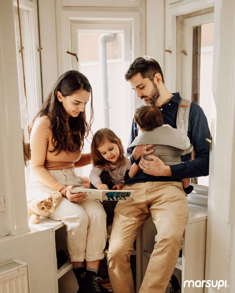 Family enjoying quality time with Marsupi Breeze - Light Grey baby carrier, promoting comfort for parents and babies.| Babymaxi