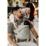 Marsupi Breeze - Pistachio baby carrier in use with parents and infant, showcasing ergonomic design for comfort | Babymaxi