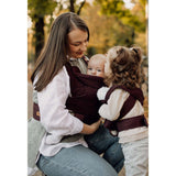 Marsupi Classic - Berry baby carrier in use, ergonomic design with a woman holding baby, ideal for newborns and toddlers | Babymaxi