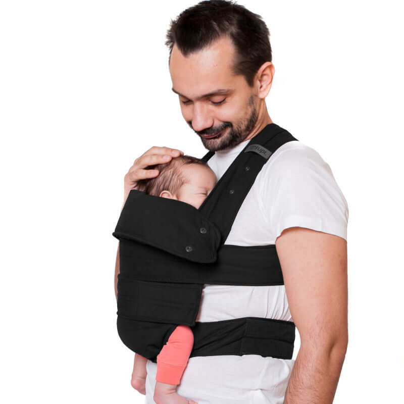 Marsupi Classic - Black baby carrier in use with a father carrying his baby comfortably | Babymaxi