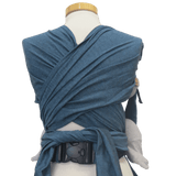 Storchenwiege Bondima Wrap Baby Carrier - Turquoise on mannequin, showcasing ergonomic design and wide straps for comfort | Babymaxi