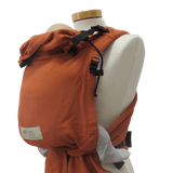 Storchenwiege Talemo Baby Carrier - Terra on a mannequin, half-buckle design, adjustable fit, perfect for newborns. | Babymaxi