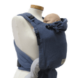 Storchenwiege Talemo Half-Buckle Baby Carrier - Denim with baby on mannequin | Babymaxi