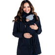 Wombat & Co. London - Wallaby Maternity & Babywearing Coat - Navy, worn by a smiling woman with a baby in front pouch | Babymaxi